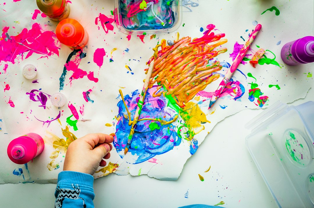 Colorful children’s art supplies spread across a table